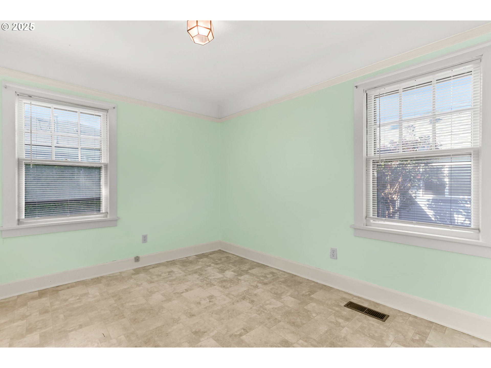 8233 Northeast Tillamook Street Portland, OR 97220 - Photo 19 of 46 an empty room with windows