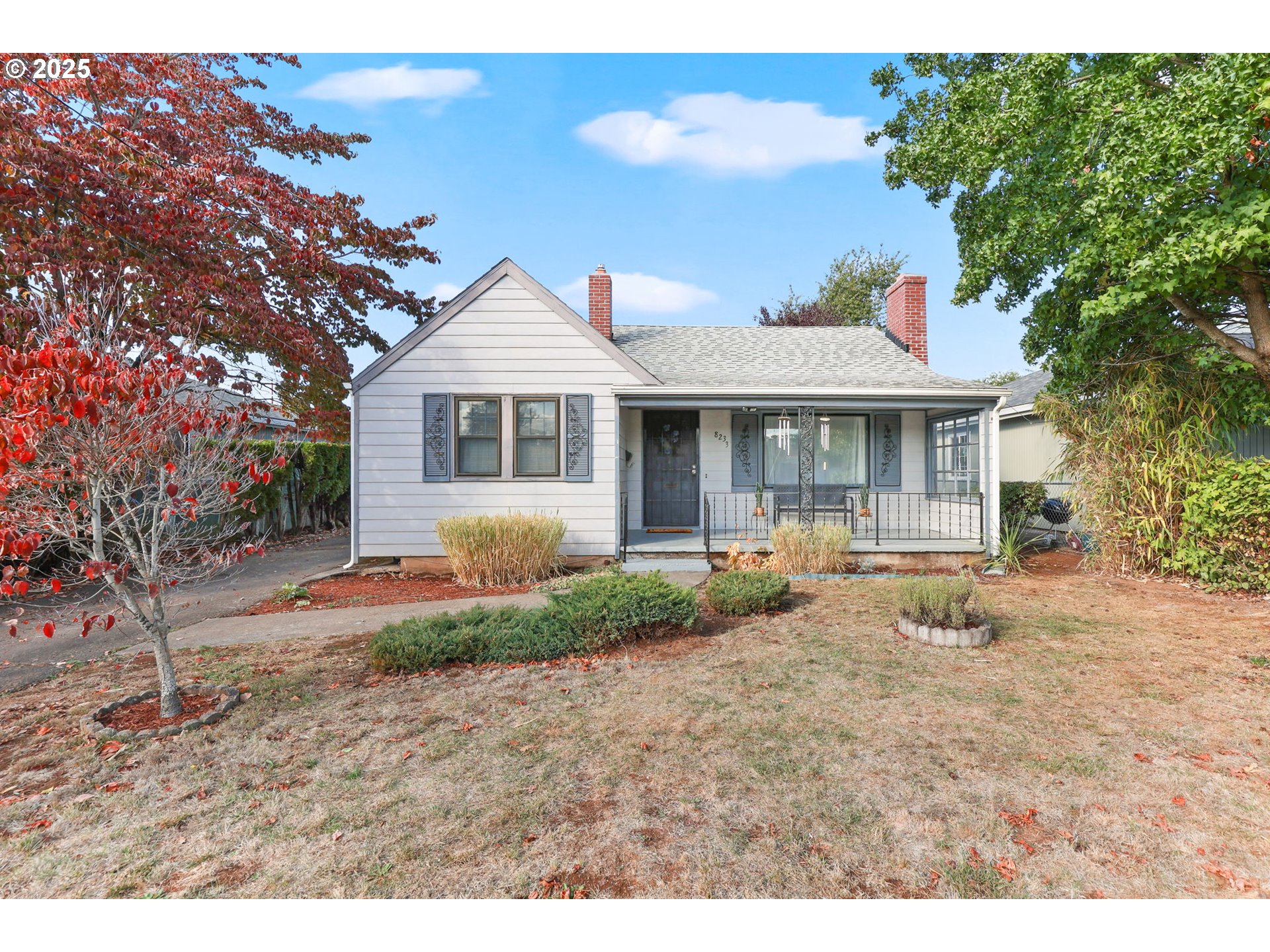 8233 Northeast Tillamook Street Portland, OR 97220 - Photo 2 of 46 a front view of a house with porch