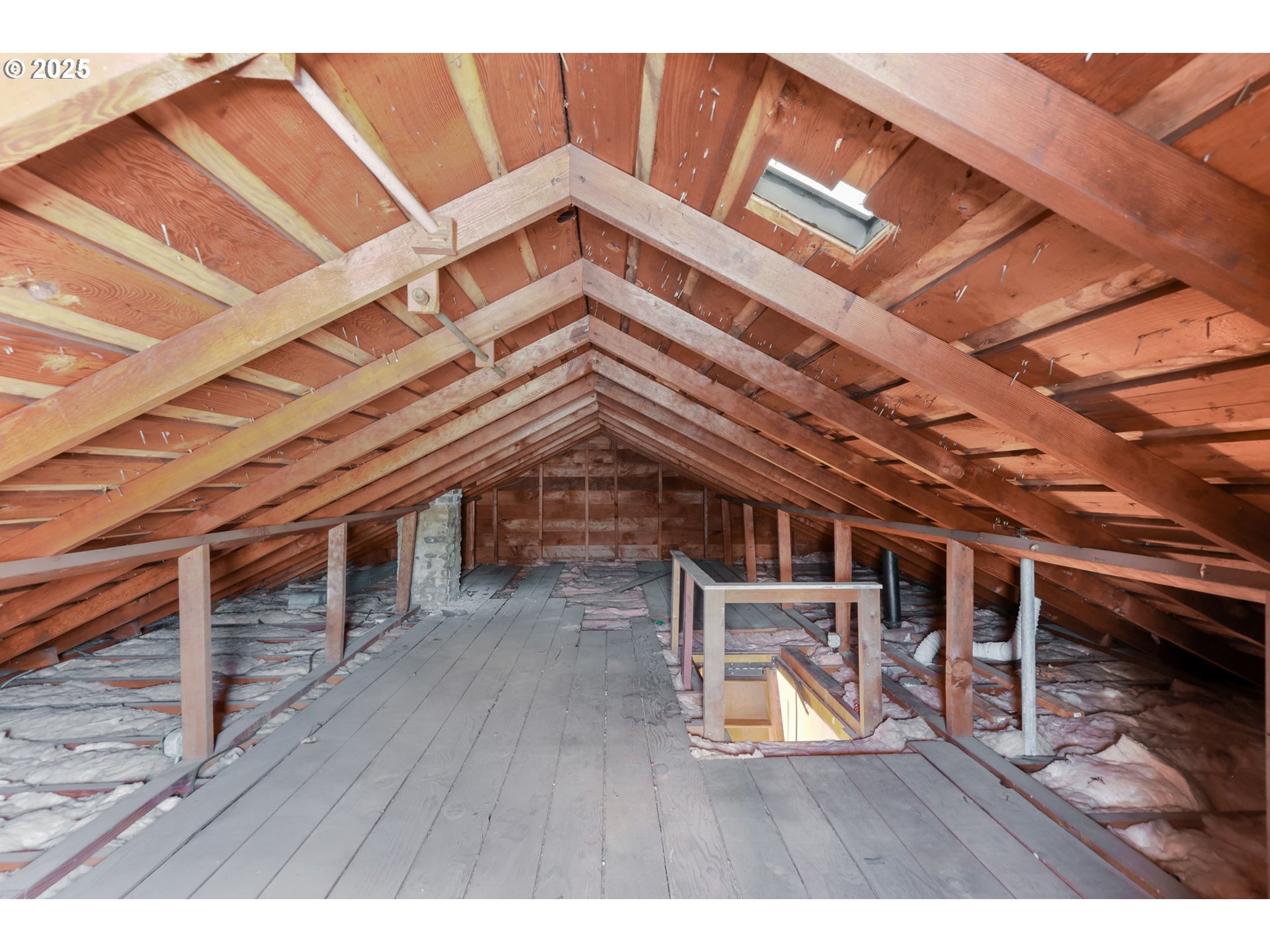 8233 Northeast Tillamook Street Portland, OR 97220 - Photo 28 of 46 a view of a roof deck with chair and wooden floor