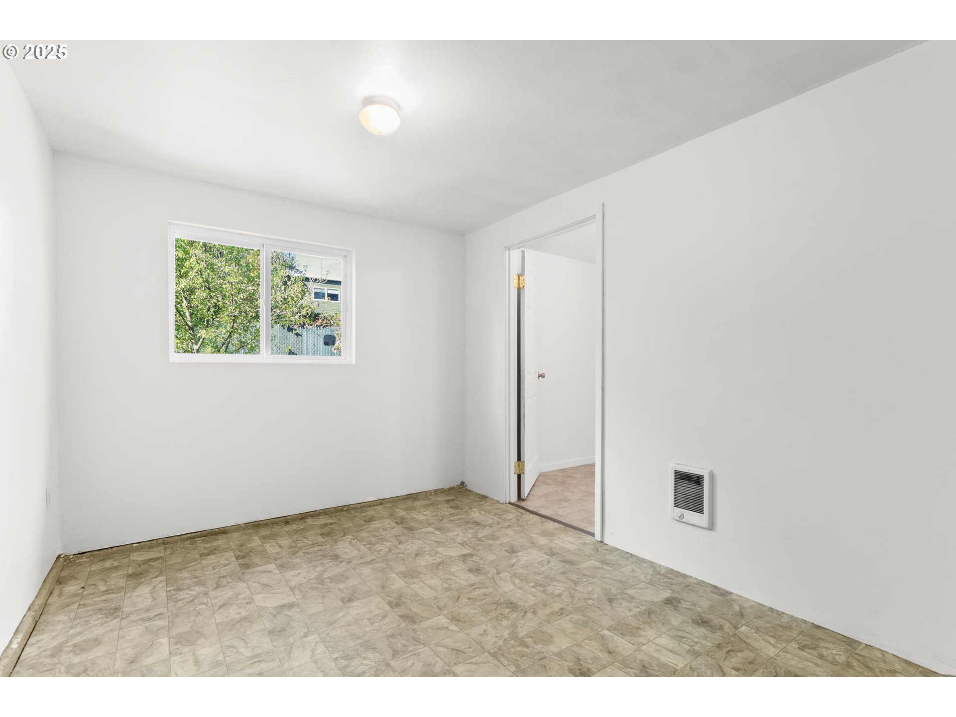 8233 Northeast Tillamook Street Portland, OR 97220 - Photo 45 of 46 an empty room with windows
