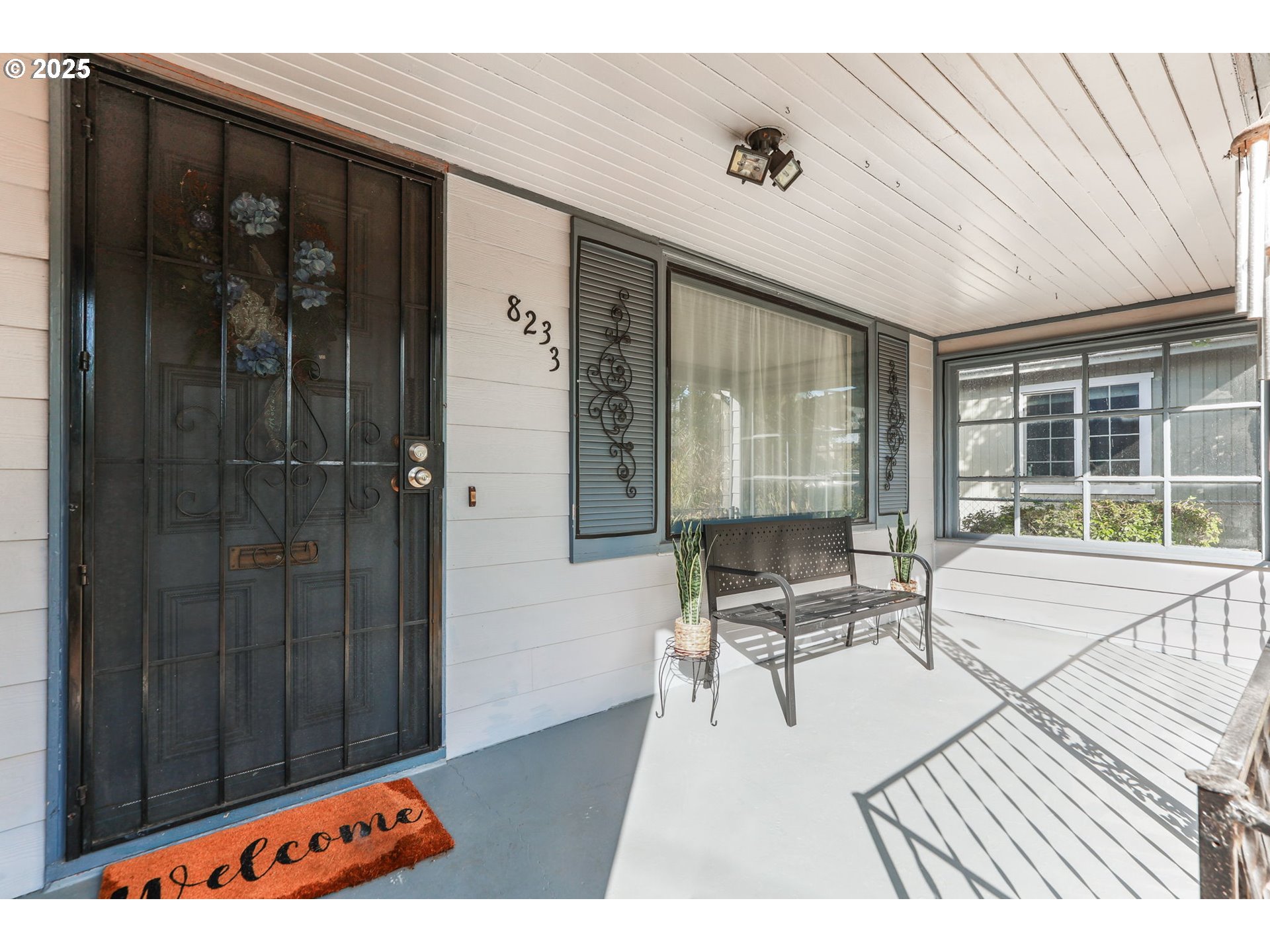 8233 Northeast Tillamook Street Portland, OR 97220 - Photo 5 of 46 a balcony with furniture and large window