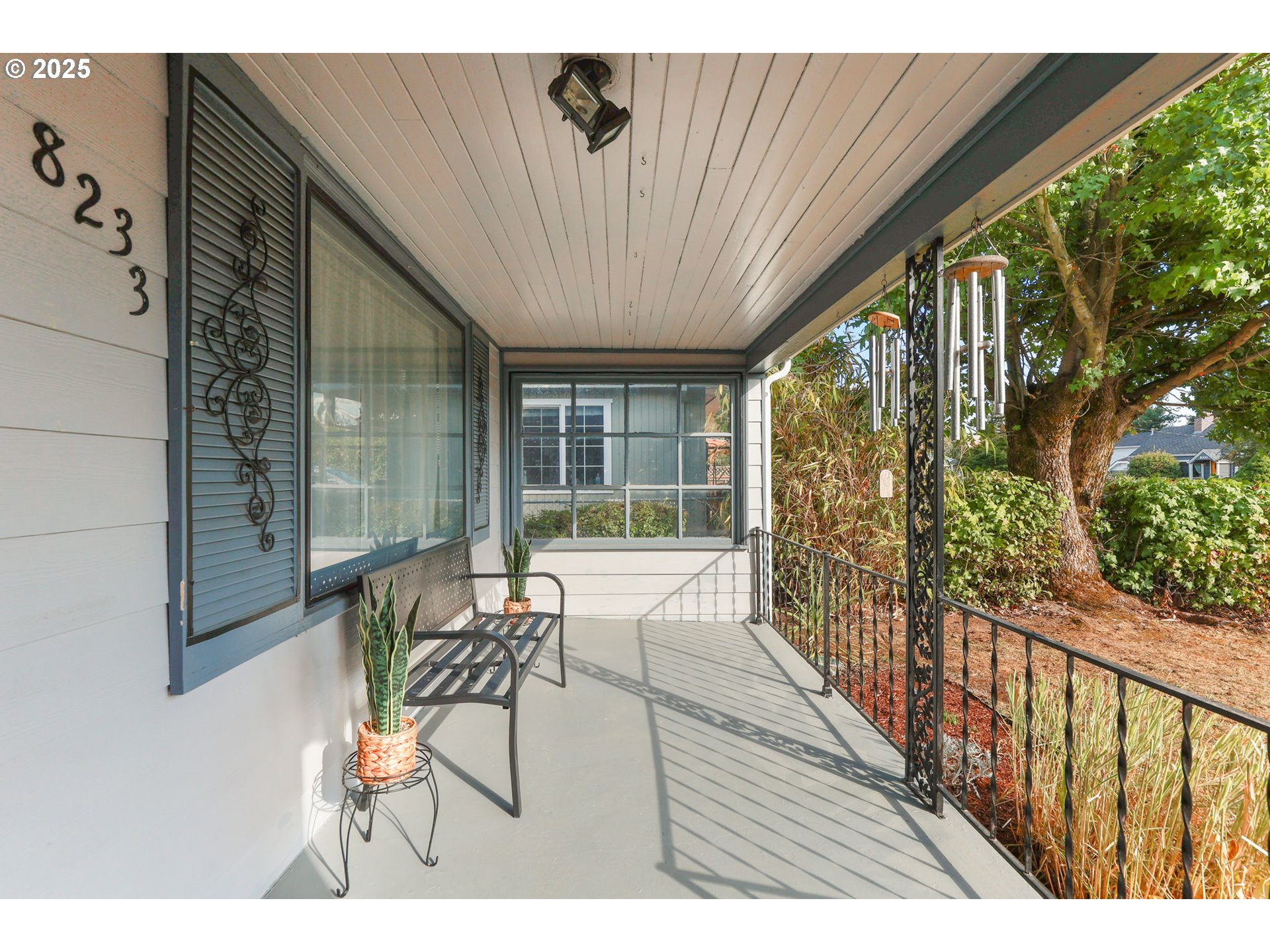 8233 Northeast Tillamook Street Portland, OR 97220 - Photo 6 of 46 a balcony with furniture and large window
