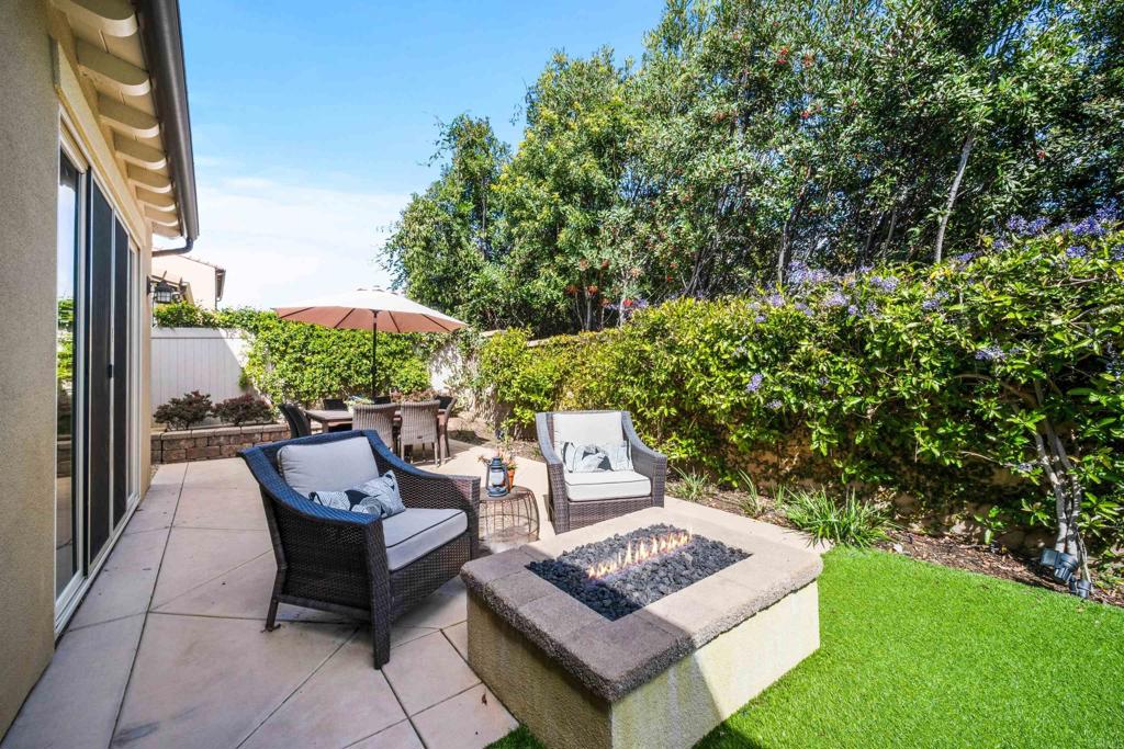 7351 Circulo Ronda Carlsbad, CA 92009 - Photo 31 of 37 a view of a sitting area with furniture and garden