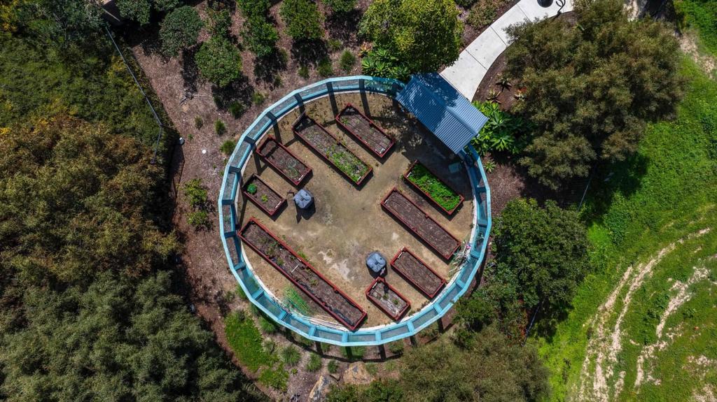 7351 Circulo Ronda Carlsbad, CA 92009 - Photo 37 of 37 an aerial view of a house with garden space and deck