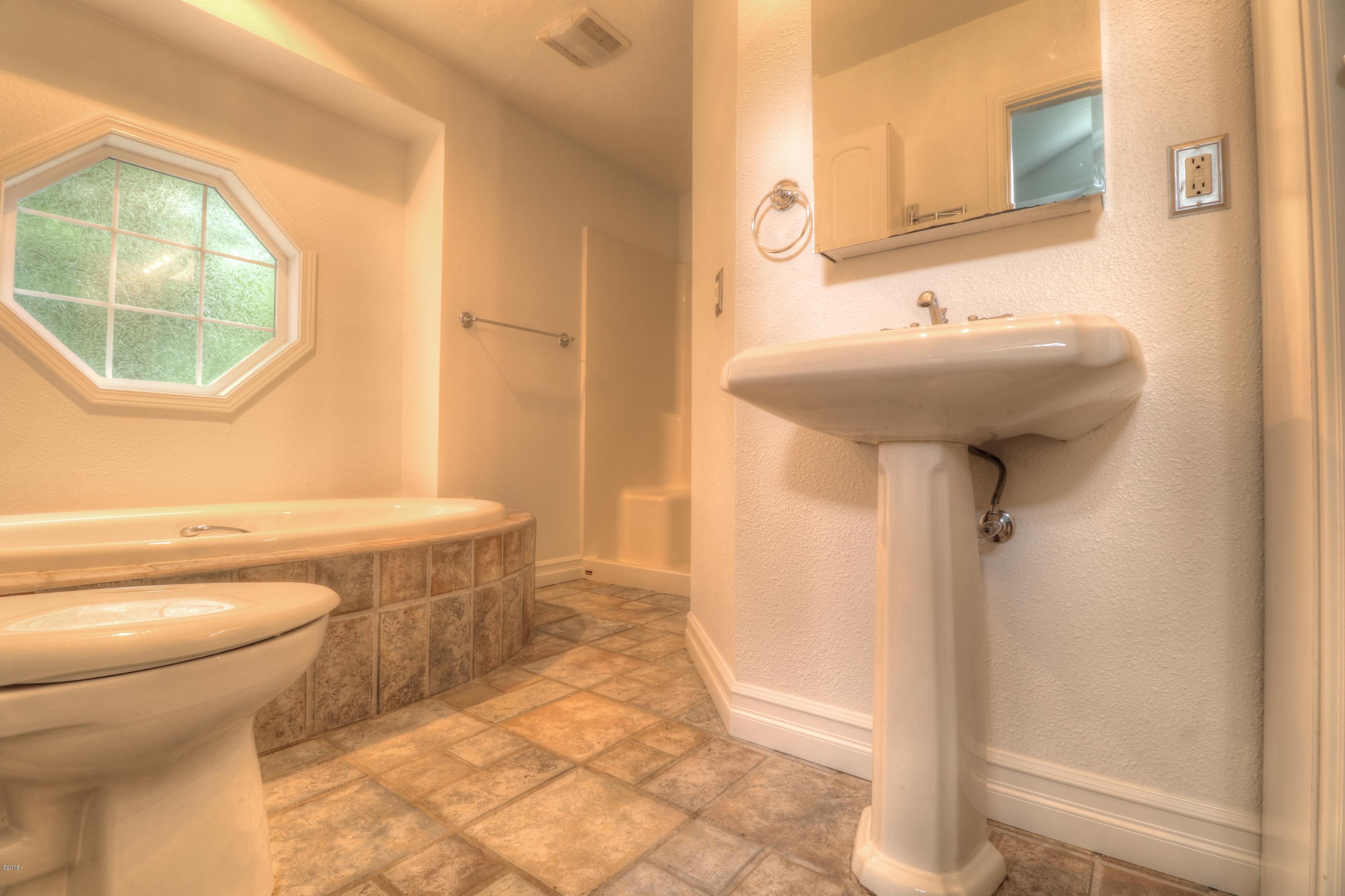 9775 Southeast Cedar Street South Beach, OR 97366 - Photo 20 of 33 Master Bathroom 1
