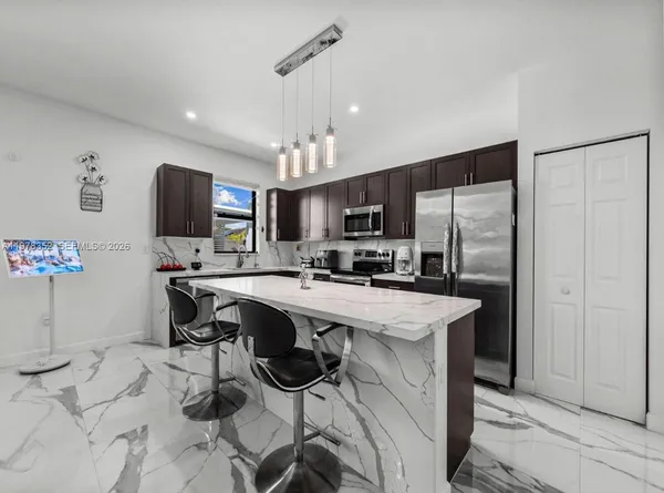 a spacious bedroom with a bed and window