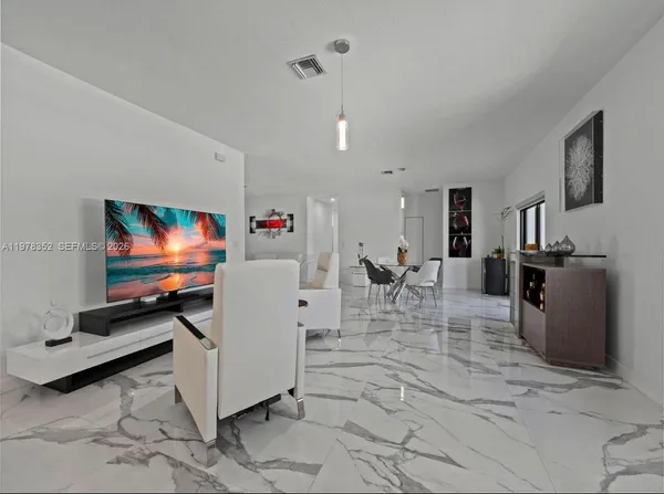 a bathroom with a sink double vanity and a mirror