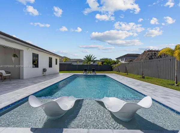a view of an outdoor space with seating area