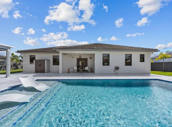 a view of a house with a patio