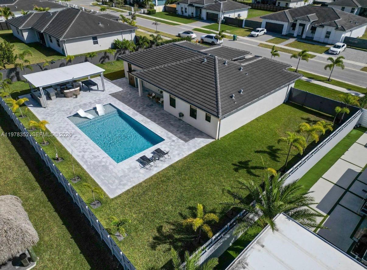 13351 Southwest 190th Street Miami, FL 33177 - Photo 37 of 45 a view of a backyard with sitting area