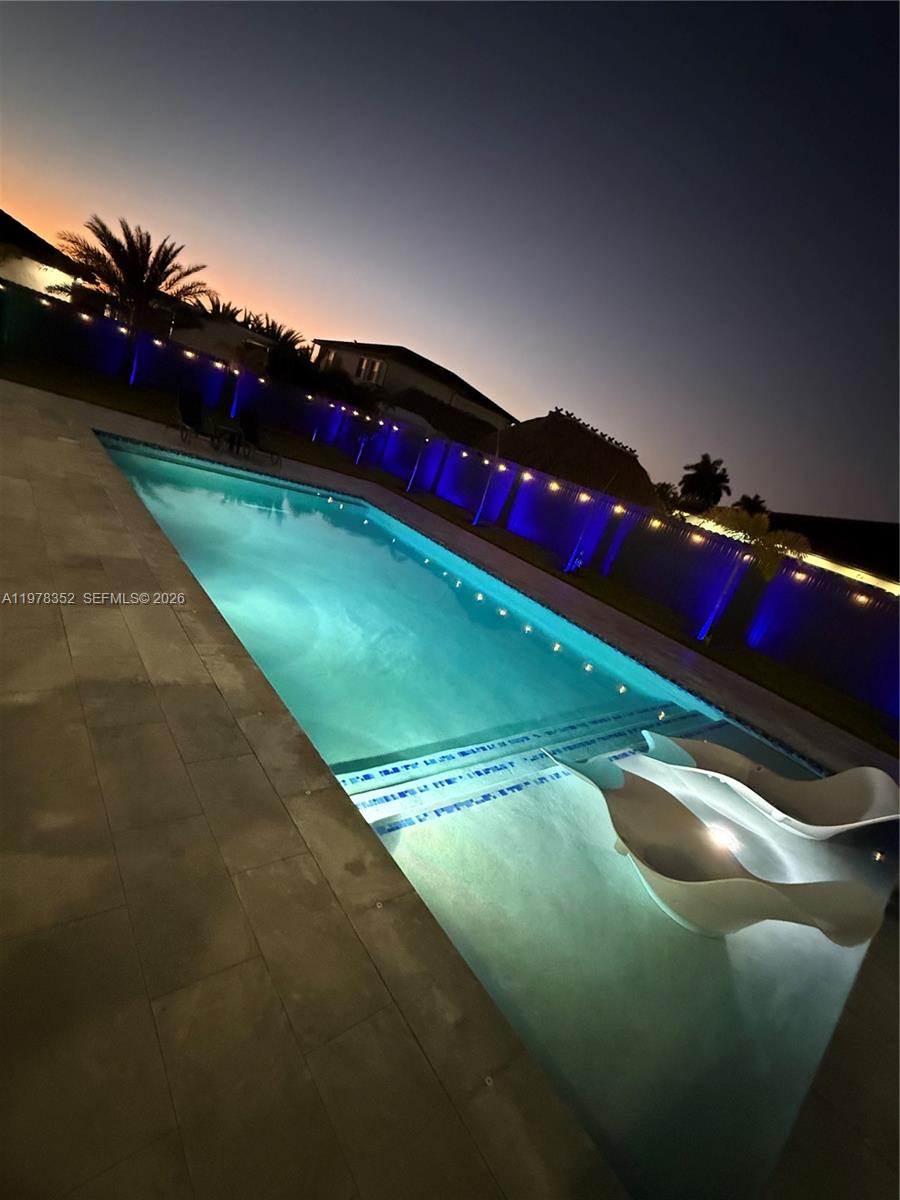 13351 Southwest 190th Street Miami, FL 33177 - Photo 45 of 45 a view of an outdoor space and swimming pool
