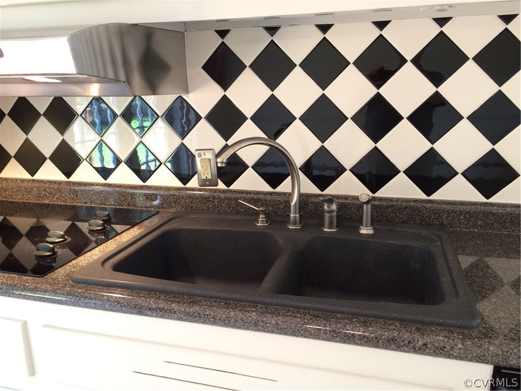 4035 Collingbourne Road Richmond, VA 23235 - Photo 16 of 30 a close view of utility and a sink