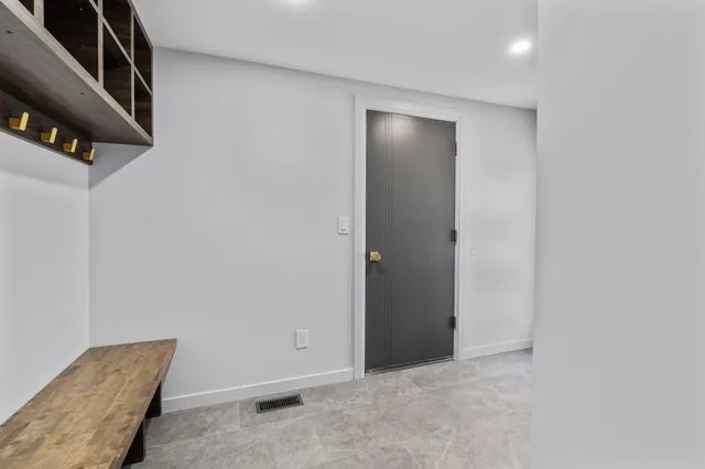 a kitchen with a stove and cabinets