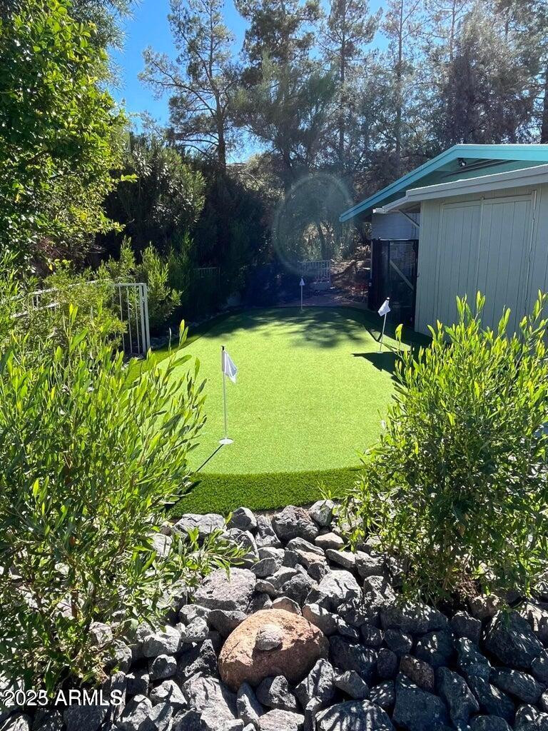 7440 East Cave Creek Road, Unit 1 Carefree, AZ 85377 - Photo 12 of 47 a view of a backyard with plants