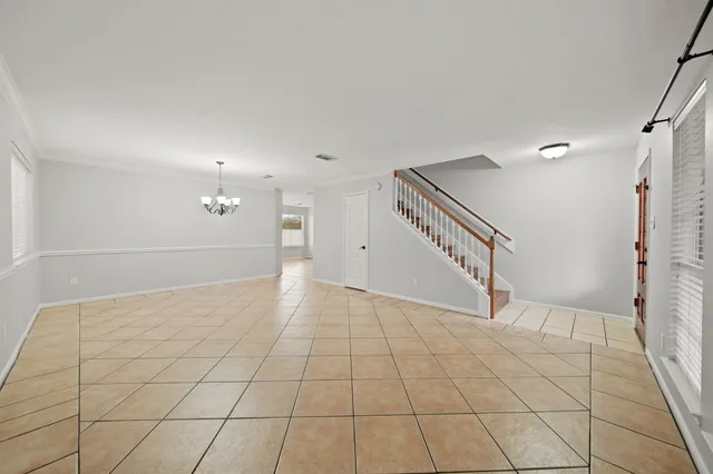 a kitchen with stainless steel appliances a refrigerator sink and cabinets