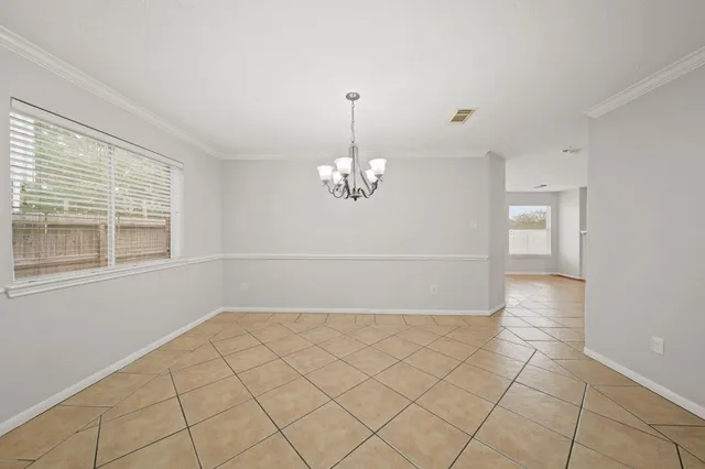 a large bathroom with a sink and a mirror