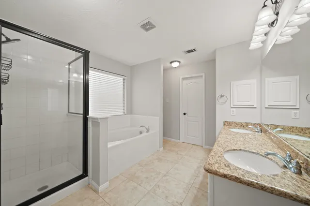 a view of a backyard of the house