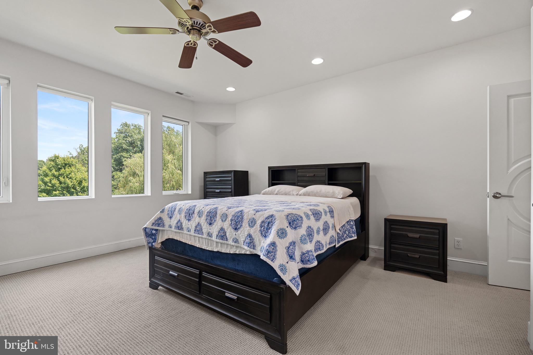 174 Virginia Key Trail Union Hall, VA 24176 - Photo 28 of 85 a bed sitting in a spacious bedroom next to a window