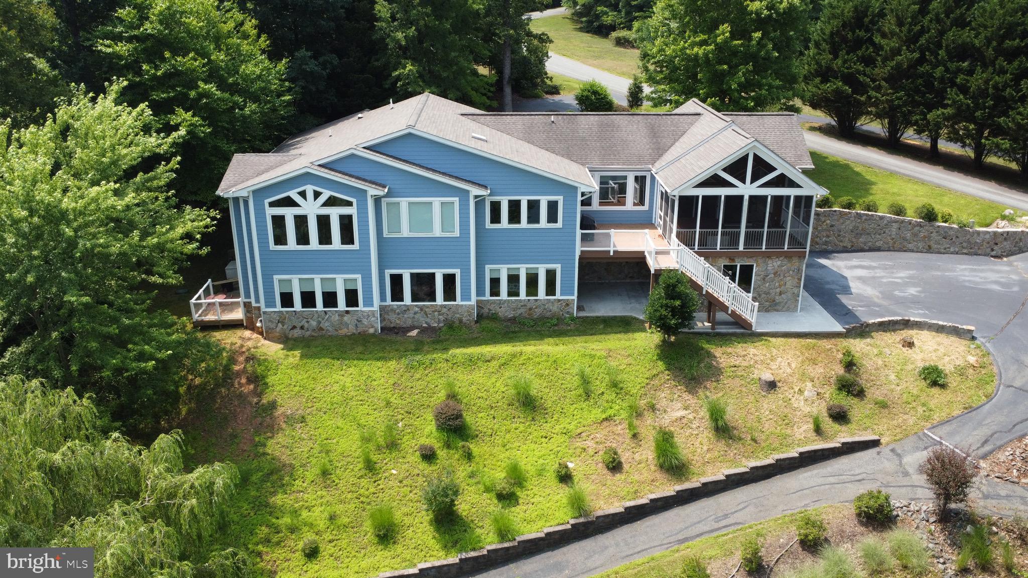 174 Virginia Key Trail Union Hall, VA 24176 - Photo 63 of 85 a aerial view of a house with swimming pool