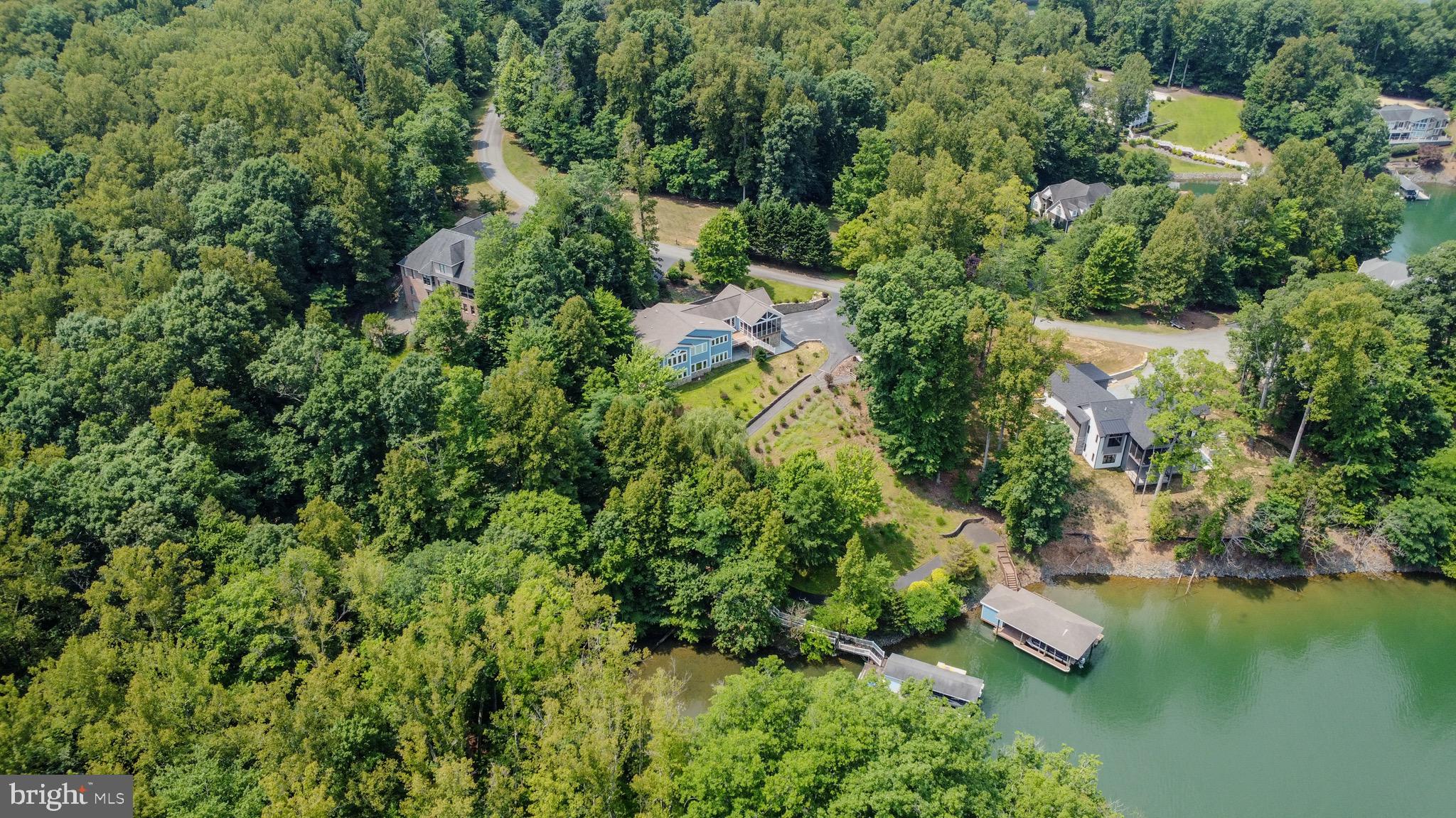 174 Virginia Key Trail Union Hall, VA 24176 - Photo 65 of 85 an aerial view of residential house with outdoor space and trees all around
