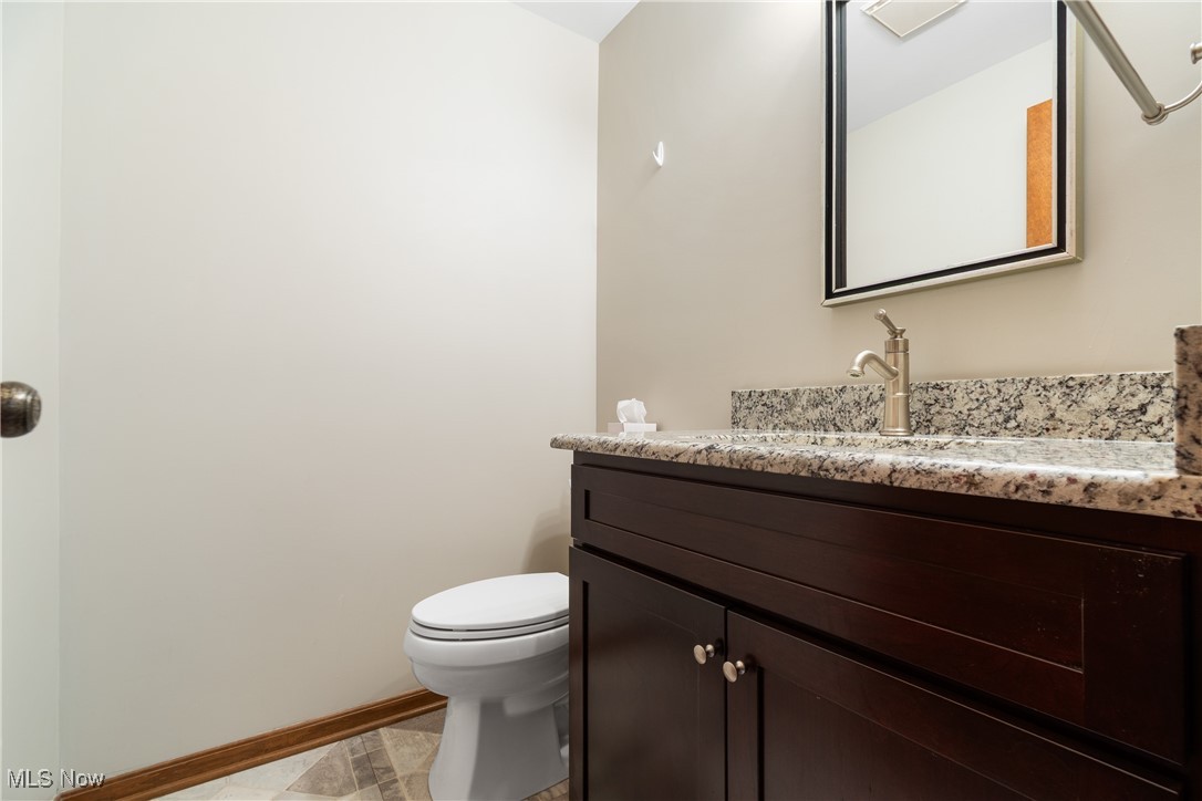 2317 Raintree Street Northeast Canton, OH 44705 - Photo 14 of 40 Bathroom with vanity and toilet