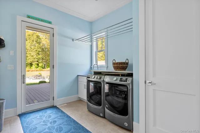 a kitchen with a stove and a window