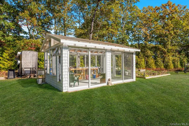 a view of a house with a garden