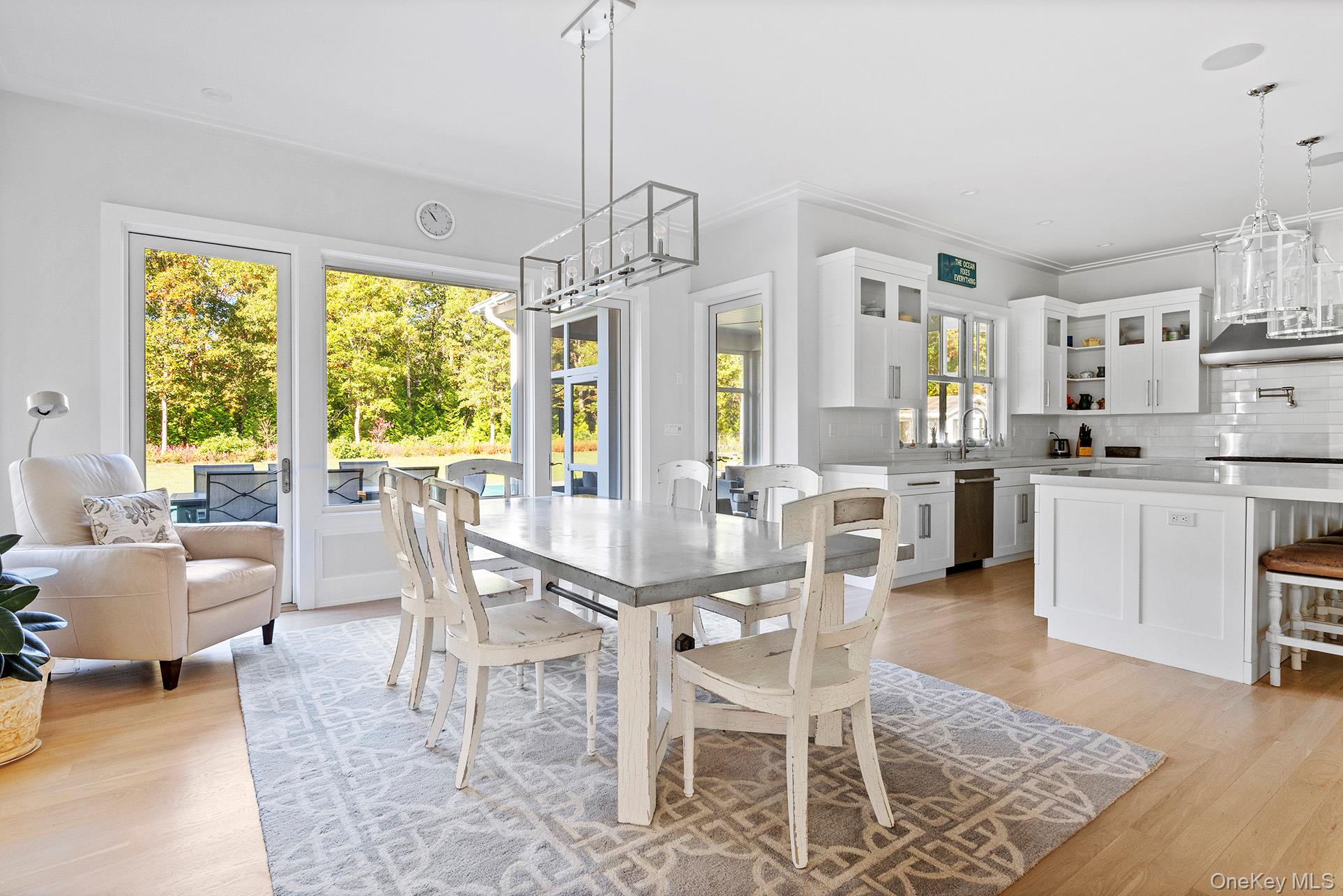 41 Arbutus Road Quogue, NY 11959 - Photo 9 of 35 a view of a dining room with furniture window and outside view