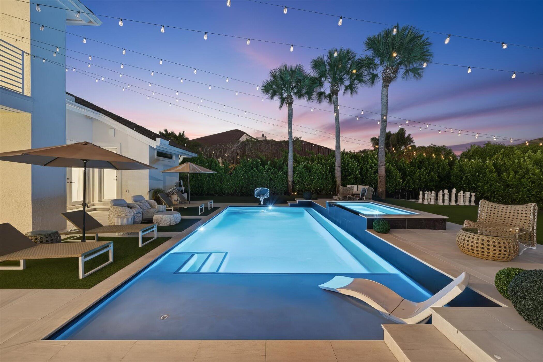3872 Northwest 53rd Street Boca Raton, FL 33496 - Photo 42 of 43 a view of swimming pool with outdoor seating
