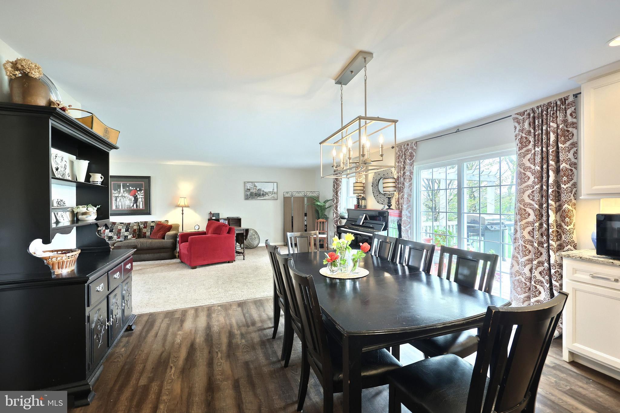 710 Apple Tree Lane Mount Wolf, PA 17347 - Photo 12 of 47 a view of a dining room with furniture window and outside view