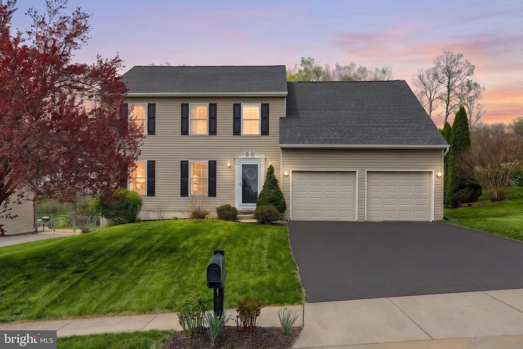710 Apple Tree Lane Mount Wolf, PA 17347 - Photo 2 of 47 front view of a house with a yard