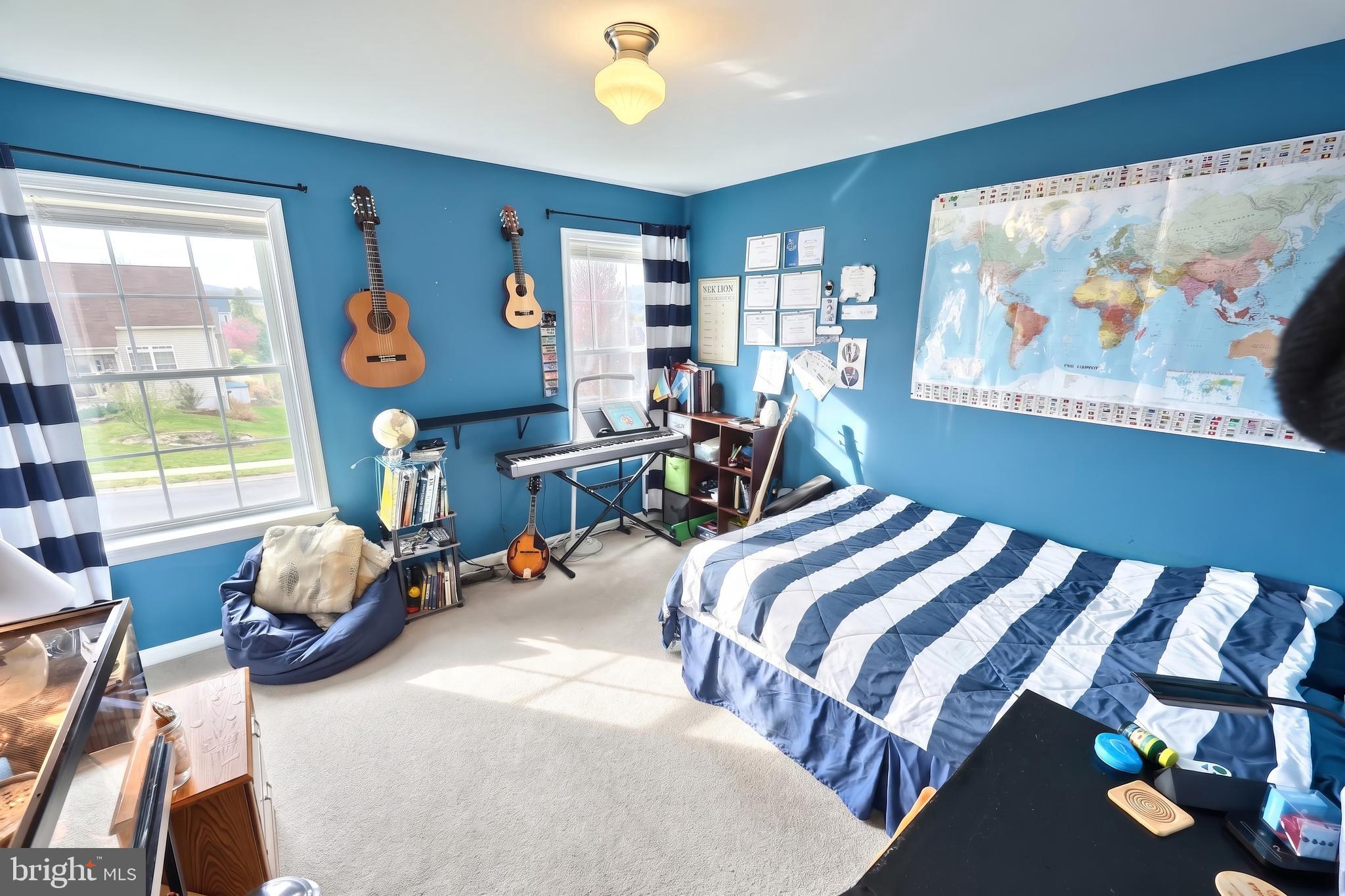 710 Apple Tree Lane Mount Wolf, PA 17347 - Photo 27 of 47 a bedroom with furniture and a window