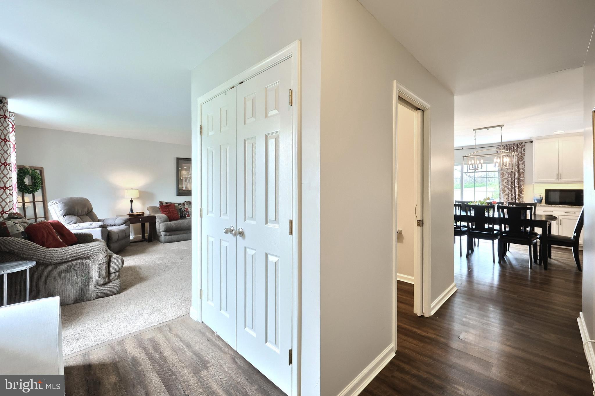 710 Apple Tree Lane Mount Wolf, PA 17347 - Photo 6 of 47 a living room with furniture and a wooden floor
