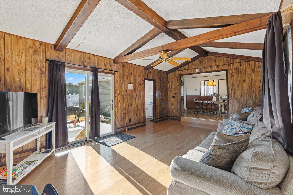 121 Catherine Avenue Buena, NJ 08310 - Photo 13 of 34 a living room with furniture and a flat screen tv