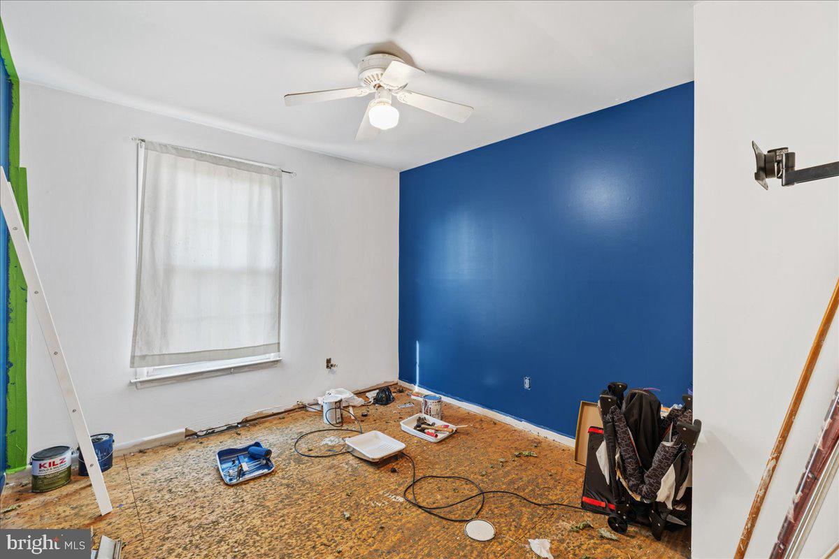 121 Catherine Avenue Buena, NJ 08310 - Photo 17 of 34 a bedroom with a bed and a chandelier