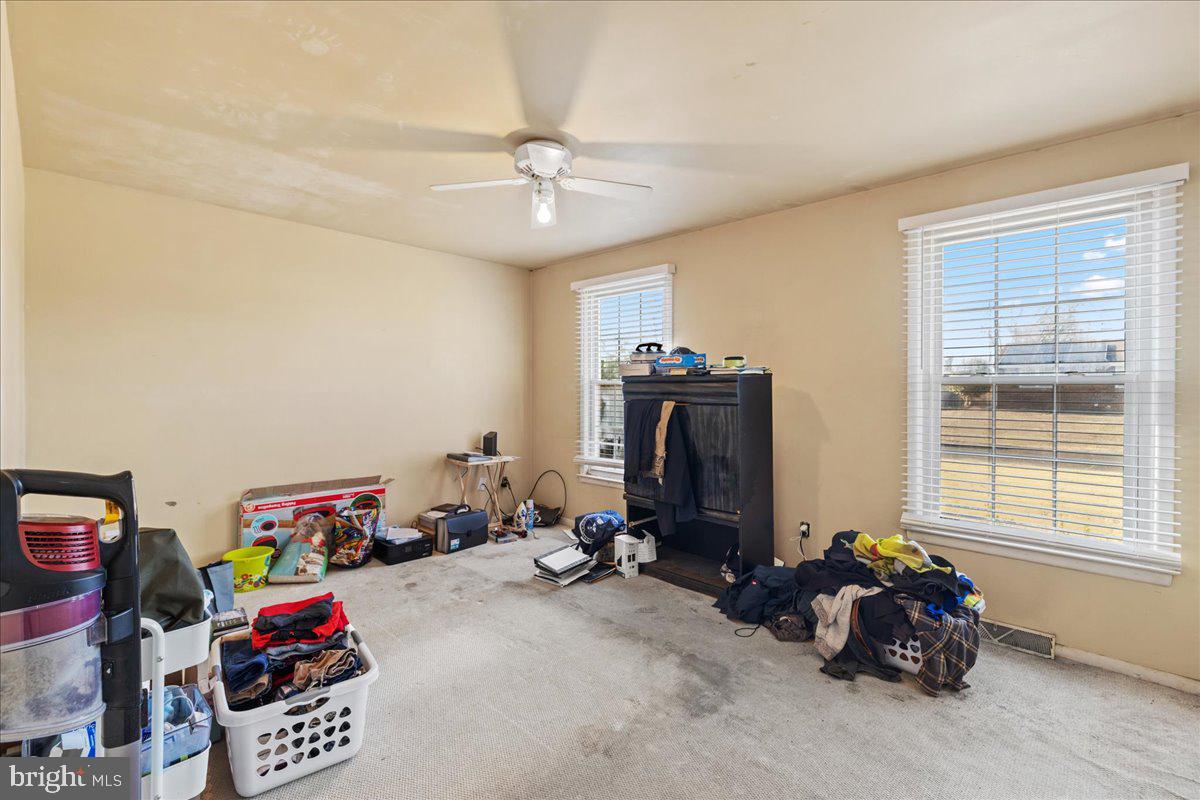 121 Catherine Avenue Buena, NJ 08310 - Photo 22 of 34 a kids room with toys and a window