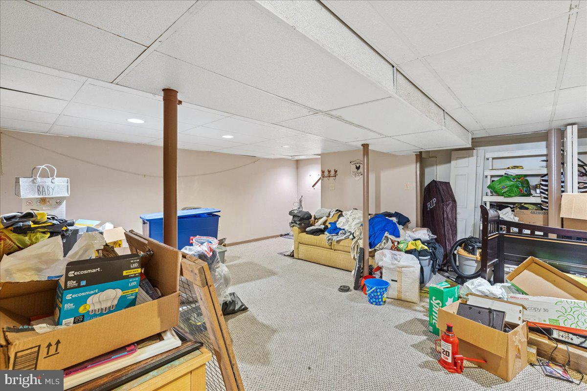 121 Catherine Avenue Buena, NJ 08310 - Photo 25 of 34 a living room filled with furniture and a window