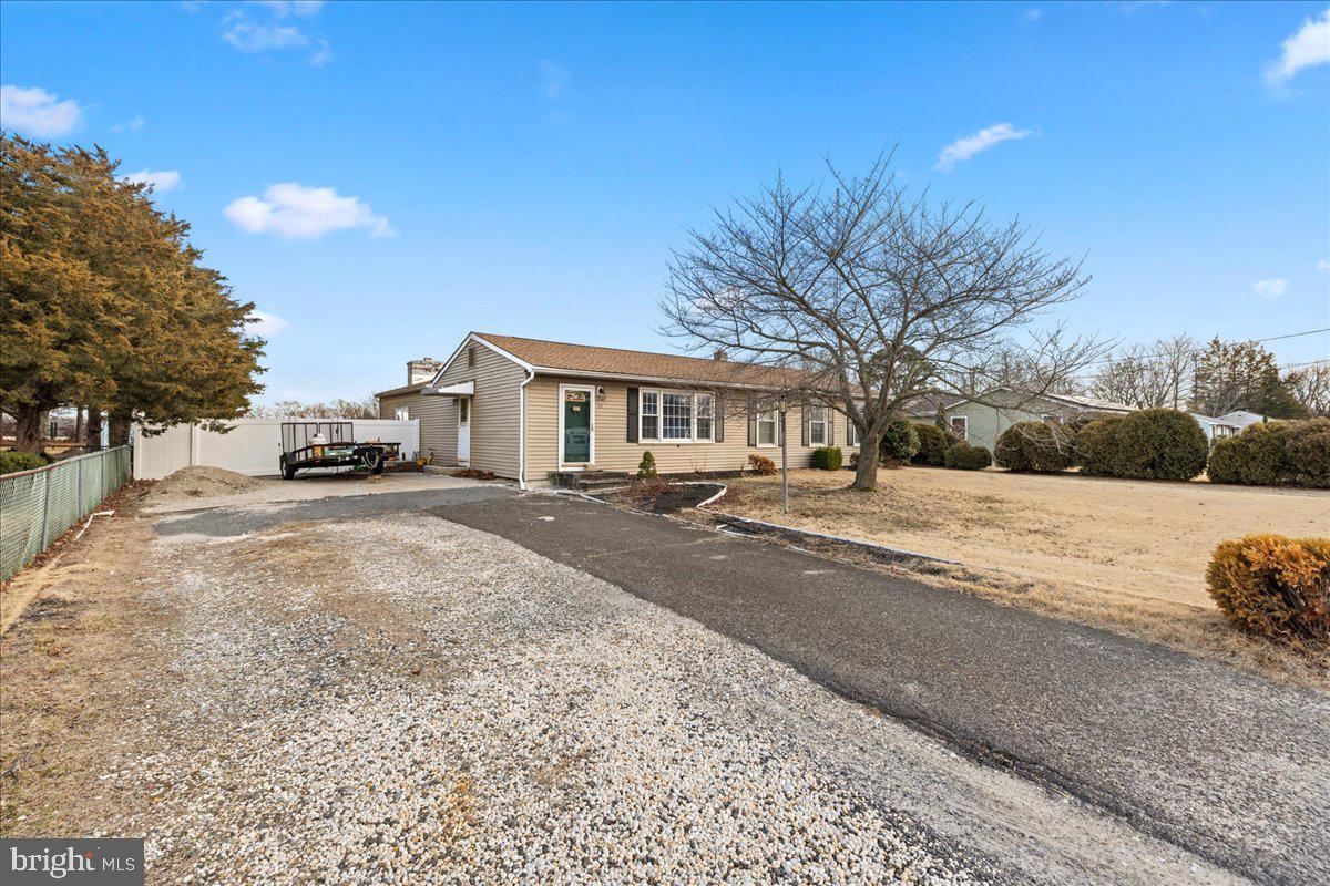 121 Catherine Avenue Buena, NJ 08310 - Photo 3 of 34 a car parked on the side of the road