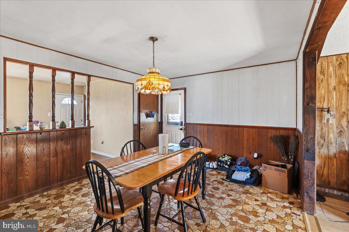 121 Catherine Avenue Buena, NJ 08310 - Photo 10 of 34 a view of a workspace with furniture and a window