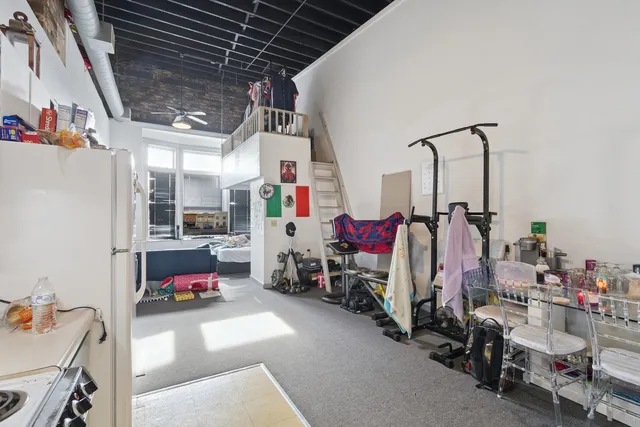 a bathroom with a sink toilet and vanity
