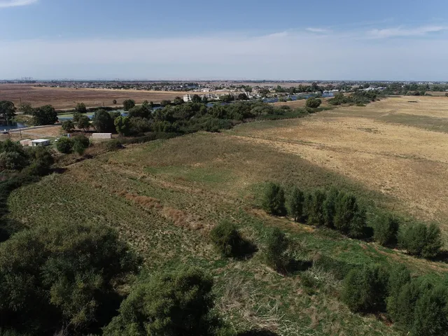 a view of a lake with a mountain in the background