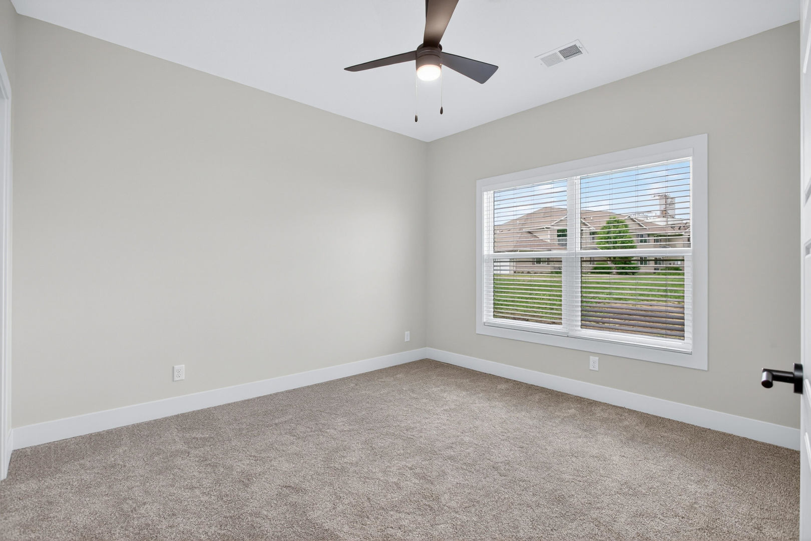 412 North 2nd Street Eldridge, IA 52748 - Photo 20 of 30 a view of an empty room with a window