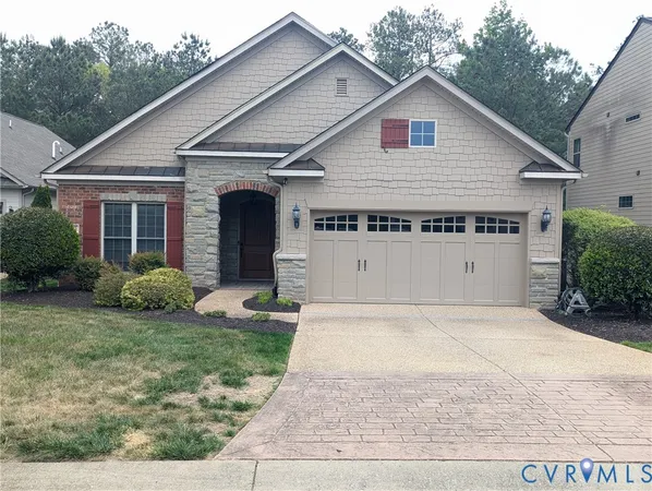 a view of backyard of house with garage