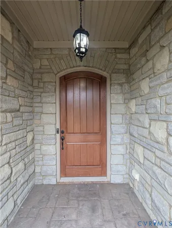 a view of a hallway with a door
