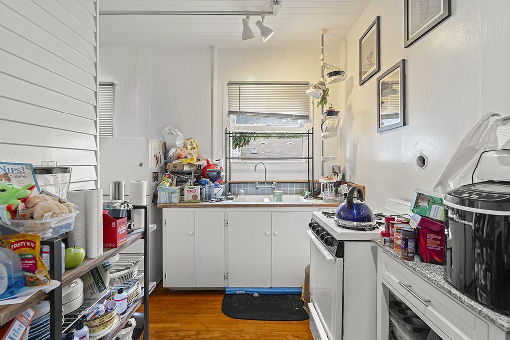 90 South 13th Street San Jose, CA 95112 - Photo 12 of 16 a room with storage and utility