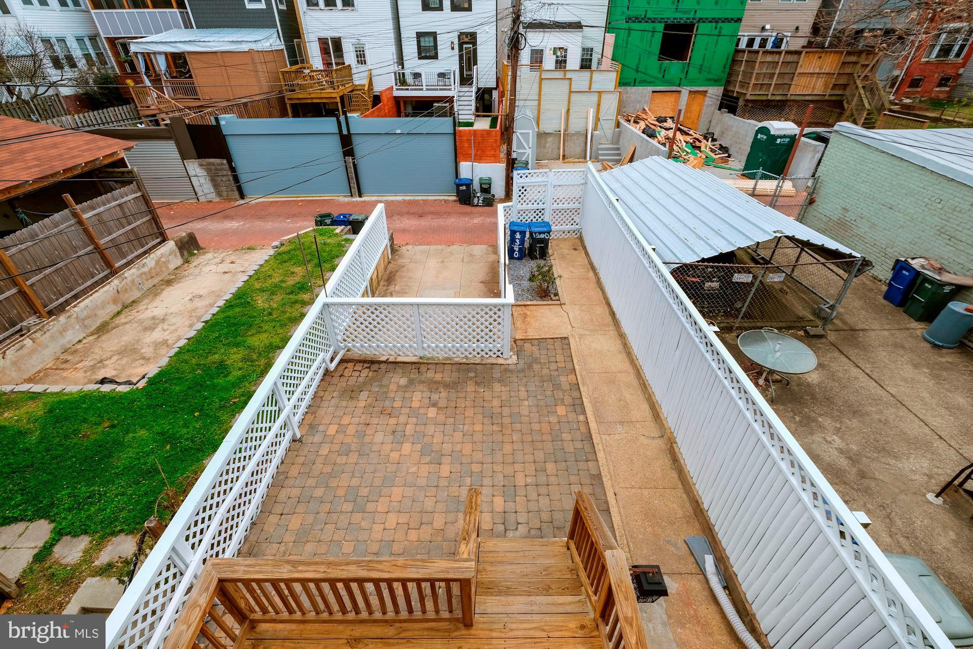 1340 Spring Road Northwest Washington, DC 20010 - Photo 25 of 35 Rear yard w/patio and parking space