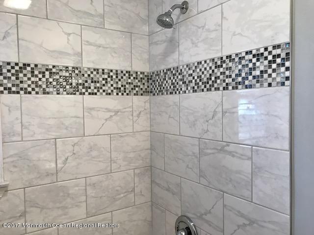 156 Wave Road Manahawkin, NJ 08050 - Photo 14 of 18 a bathroom with a shower