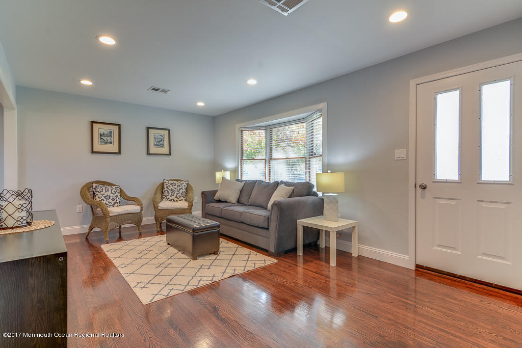 156 Wave Road Manahawkin, NJ 08050 - Photo 2 of 18 a living room with furniture and wooden floor