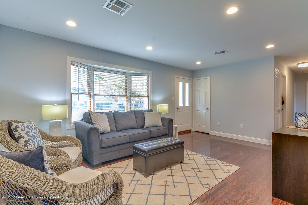 156 Wave Road Manahawkin, NJ 08050 - Photo 3 of 18 a living room with furniture and a window