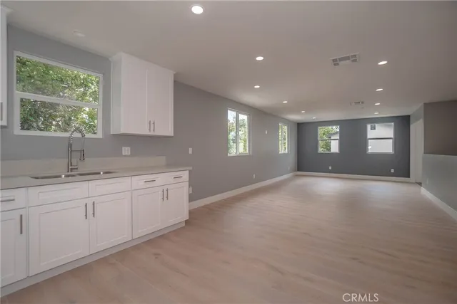 a view of a kitchen and a sink